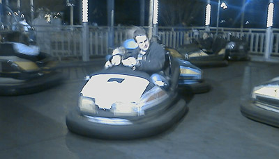 Me driving a bumber car. Will can just barely be seen, sitting to my right