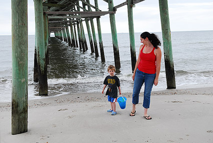 Surreptitiously searching for seashells on the seaside - say that five times fast (click for a better view)