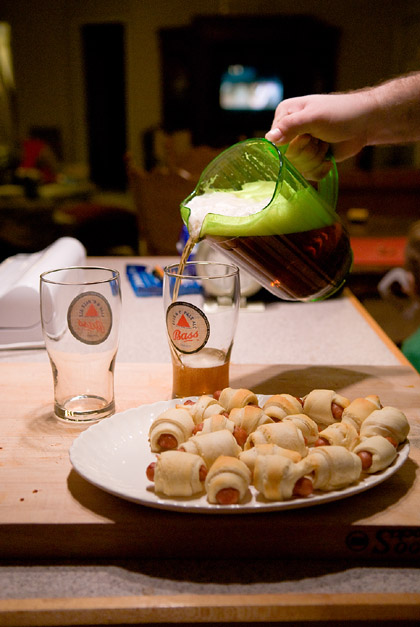 Yes, that is beer being poured from a margarita pitcher